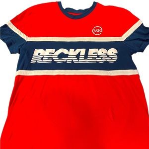 Red “YOUNG & RECKLESS” men’s sz Large tee shirt.